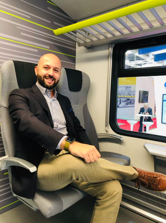 ELeatherGroup's tweet photo. It was great seeing everyone at @EXPO_Ferrov! If you didn’t get to check out these #StadlerRail seats in person, take a look here! Kick back and relax like Alberto here as these headrests were fitted using our #engineeredleather. #EXPOFer19 https://t.co/Xm2OOHoasX