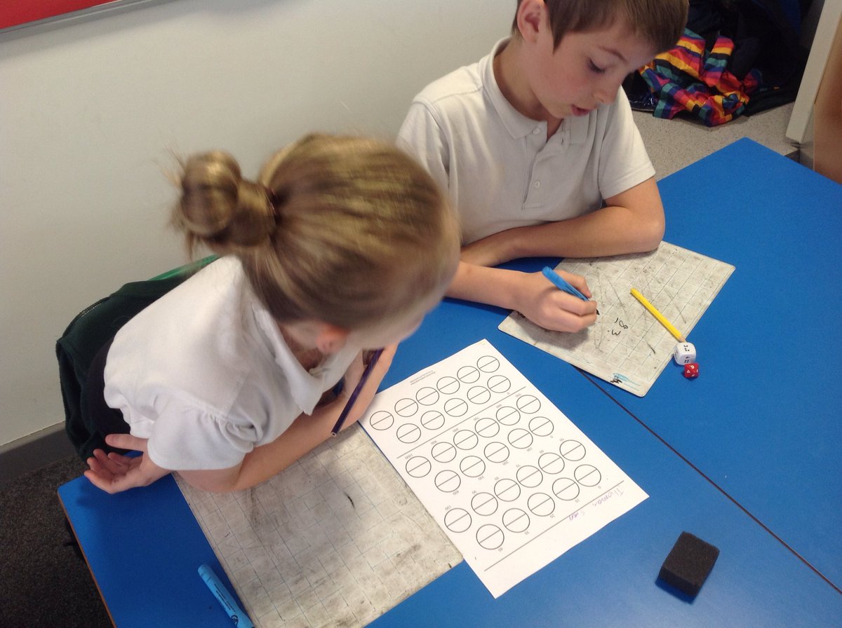 TGPS_NorthLincs's tweet photo. Year 5 are playing a rounding game. We have to roll the dice to create numbers and then round them. Then we get to colour half of a circle. The person with the most halves wins. #TGPSMaths #TGPSYear5 #TGPSTeambuild #TGPSEngaginglearners https://t.co/OHaaOnhpc0