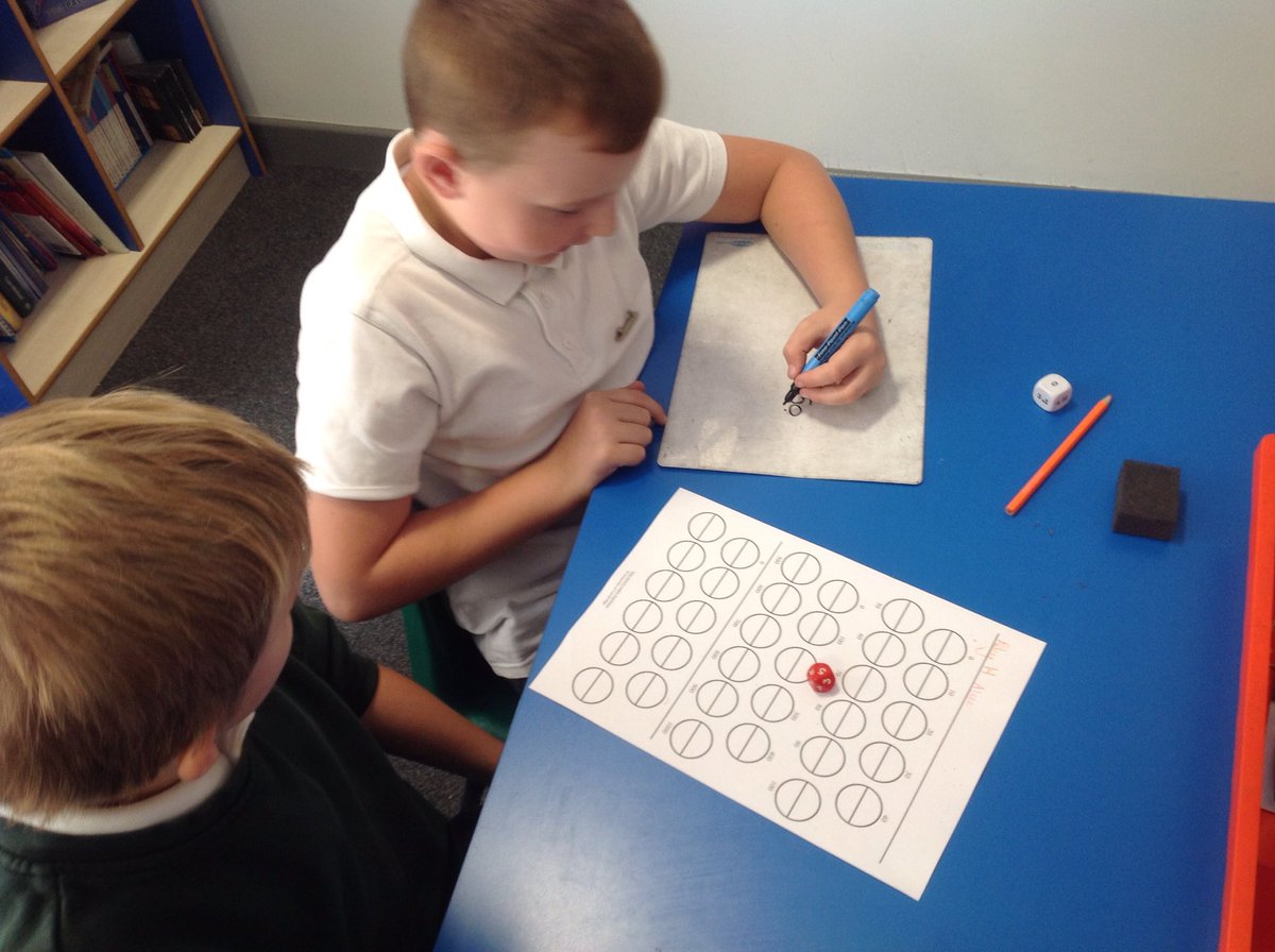 TGPS_NorthLincs's tweet photo. Year 5 are playing a rounding game. We have to roll the dice to create numbers and then round them. Then we get to colour half of a circle. The person with the most halves wins. #TGPSMaths #TGPSYear5 #TGPSTeambuild #TGPSEngaginglearners https://t.co/OHaaOnhpc0