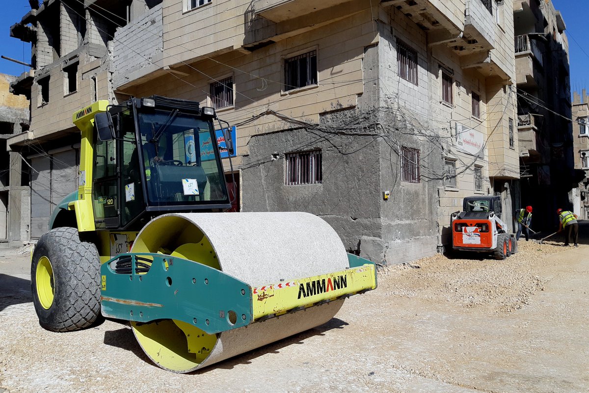 the photo was taken during #ERT's work on spreading the aggregate in Al-Motaz street, in #Raqqa city