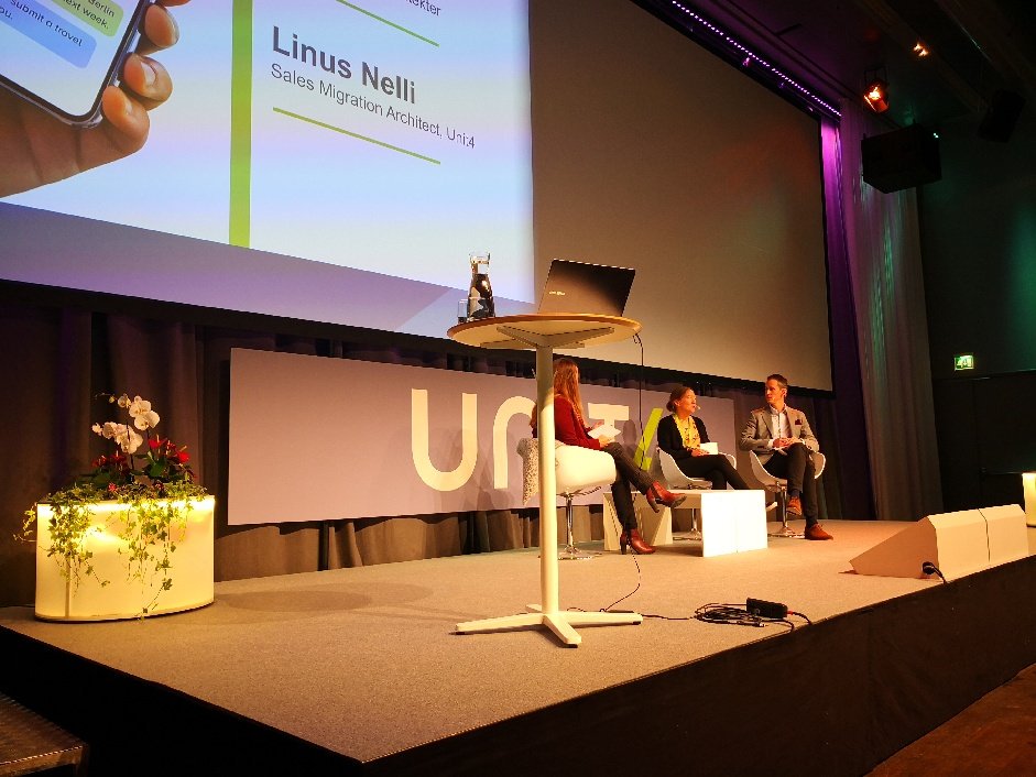 MikeEttling's tweet photo. White Architects on stage at #Unit4Connect19 talking about how our chatbot Wanda has helped them streamline their operations #Unit4 #Cloud #bots https://t.co/5hUPisoz58