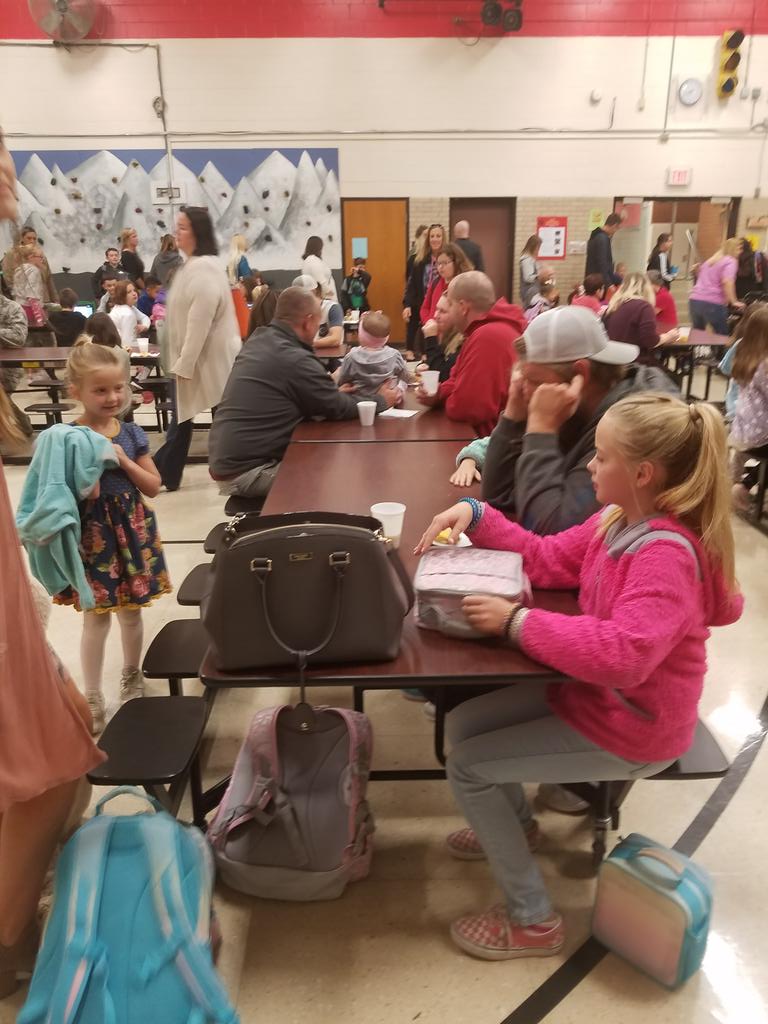PARKWDprincipal's tweet photo. Breakfast with a Buddy, Dog Man and our PTO Book Fair. It is a busy week at Parkwood! https://t.co/oRUJhGStDg