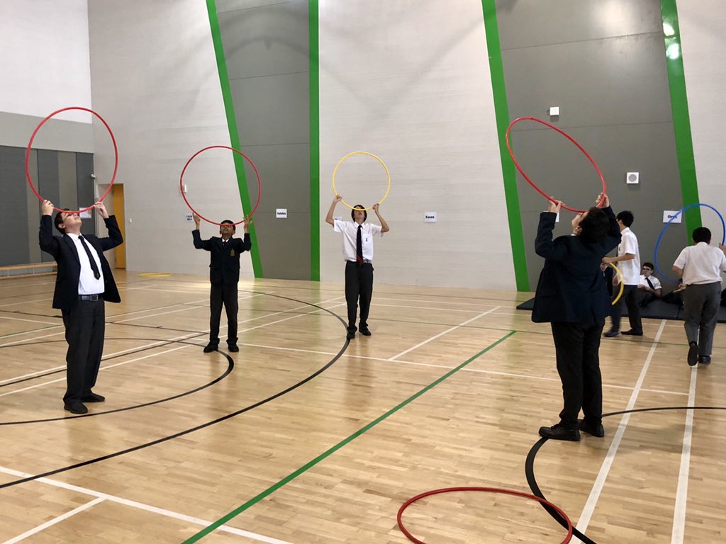 SLuptonRAD's tweet image. Lunch duty in the desert @ReptonAbuDhabi Too hot to go outside, entertain them in the gym they say, it will be easy😂 Life’s a circus, you may as well practise for it! #hoolahoopchallenge #circusskills #clownlife