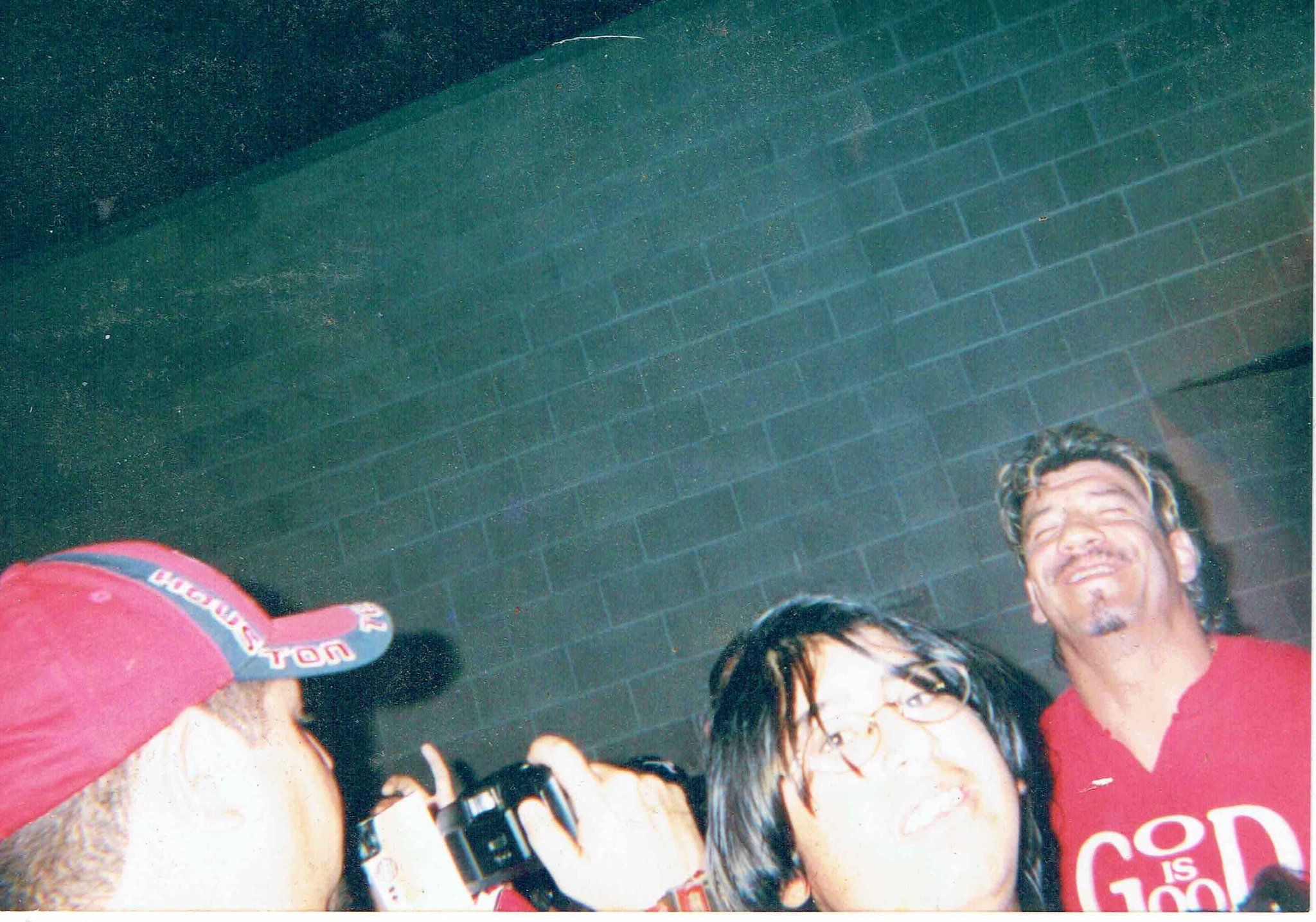 Happy birthday Eddie Guerrero. Photo I took of him in 2003, with my brother in front of him. 