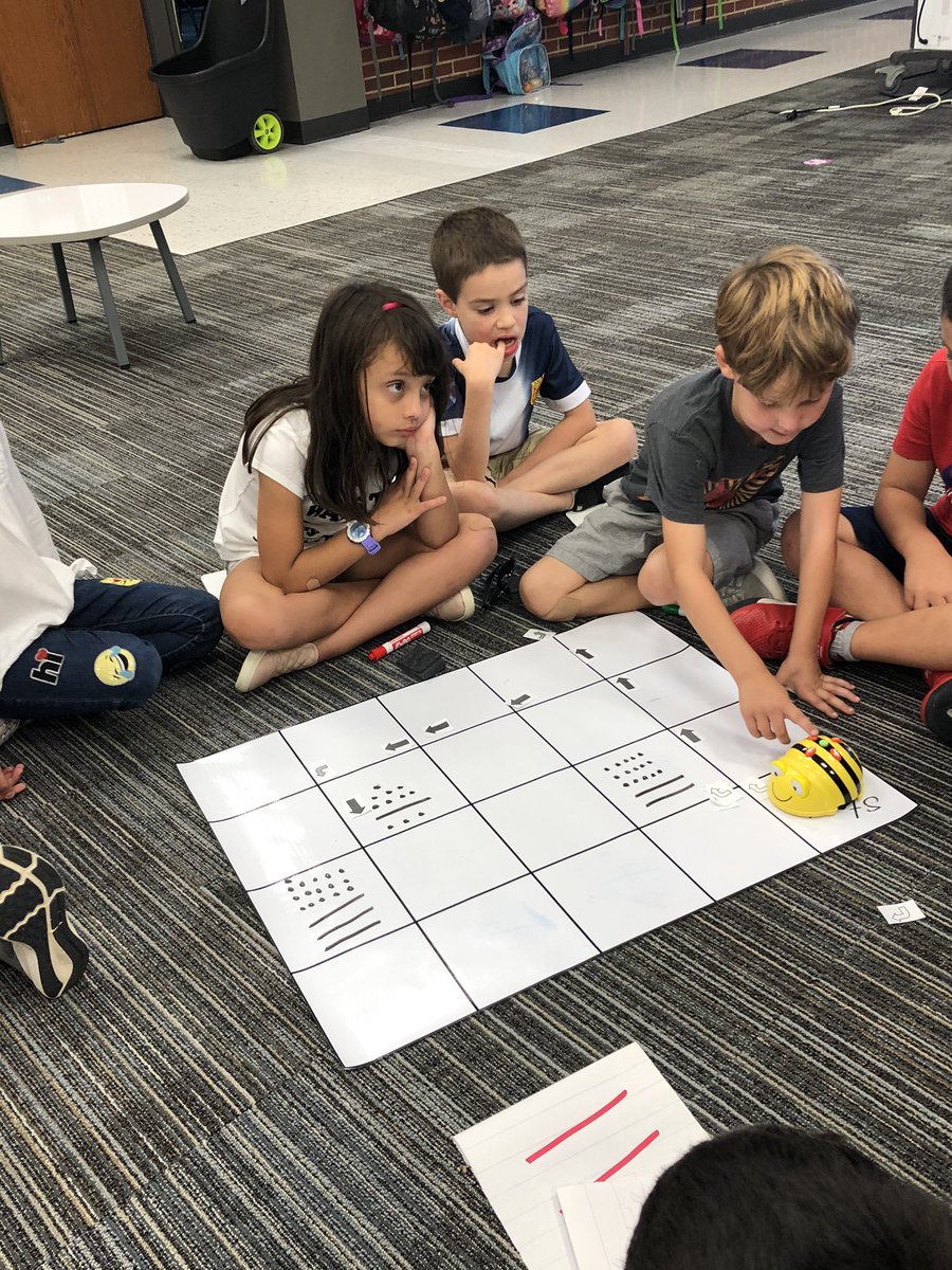 TechieCoach303's tweet photo. @mrs_frisby 1st graders @smithelem_Noel coding with #beebots. Wow the discussion and problem solving happening is AAAAMAZING!!! #futureready #ourFISDstory #smithrocks #rockstars https://t.co/r99JaUCsnD