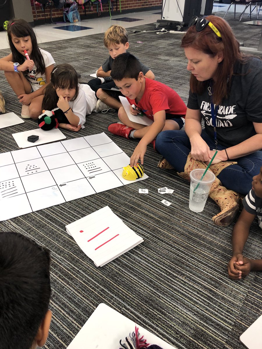 TechieCoach303's tweet photo. @mrs_frisby 1st graders @smithelem_Noel coding with #beebots. Wow the discussion and problem solving happening is AAAAMAZING!!! #futureready #ourFISDstory #smithrocks #rockstars https://t.co/r99JaUCsnD
