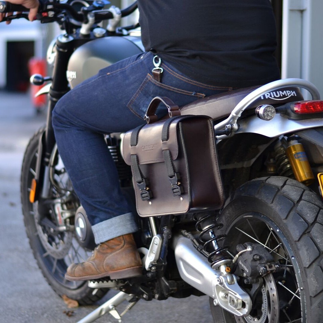 Nomad II pannier with AustriAlpin cobra buckles. #darkstarleather #panniers #triump