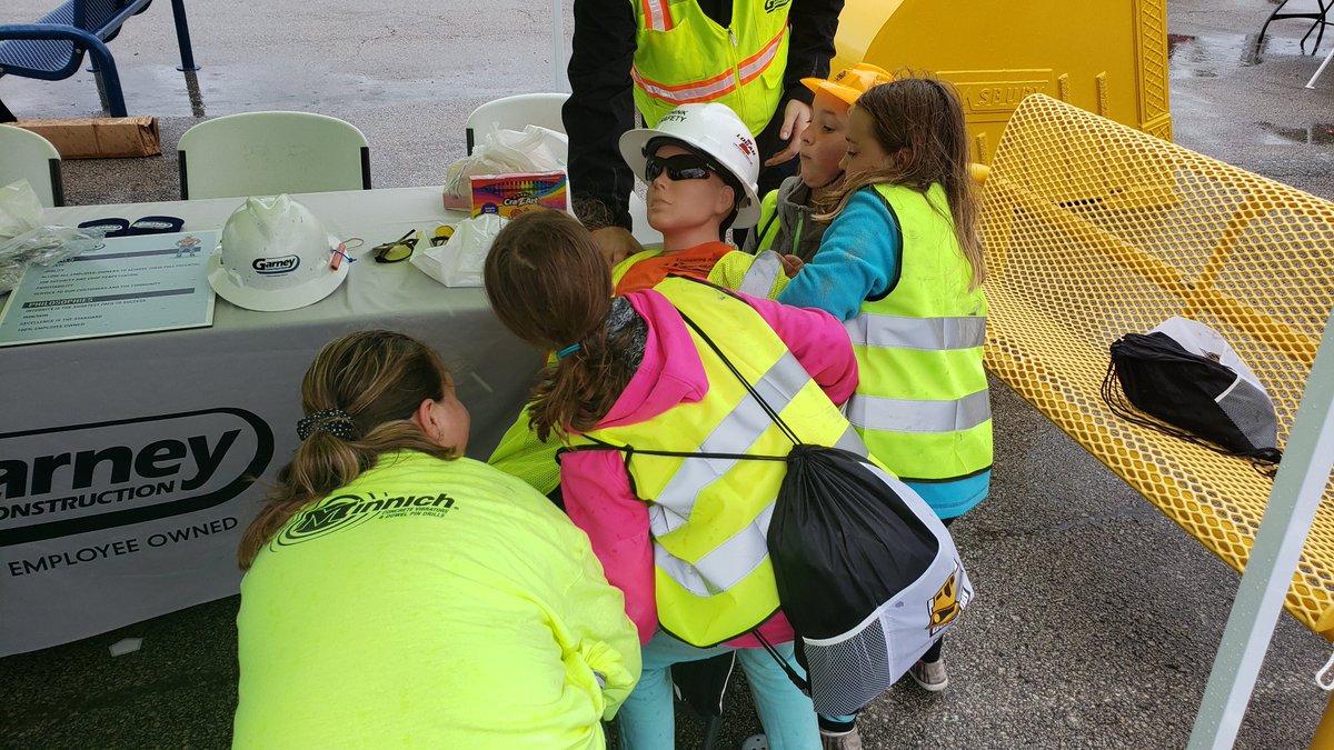 ThinkViralKC's tweet photo. Saving someone is harder than it looks! I grabbed a group of girls at @NUCA_KC's #DozerDaysKC & tried to lift @GarneyConstruct's safety dummy off the chair. After several attempts, one of the girls threw up her hands & said, "I guess he just has to die!" ๐ฎ๐คฃ #womeninconstruction https://t.co/Q4KUgxsQOB