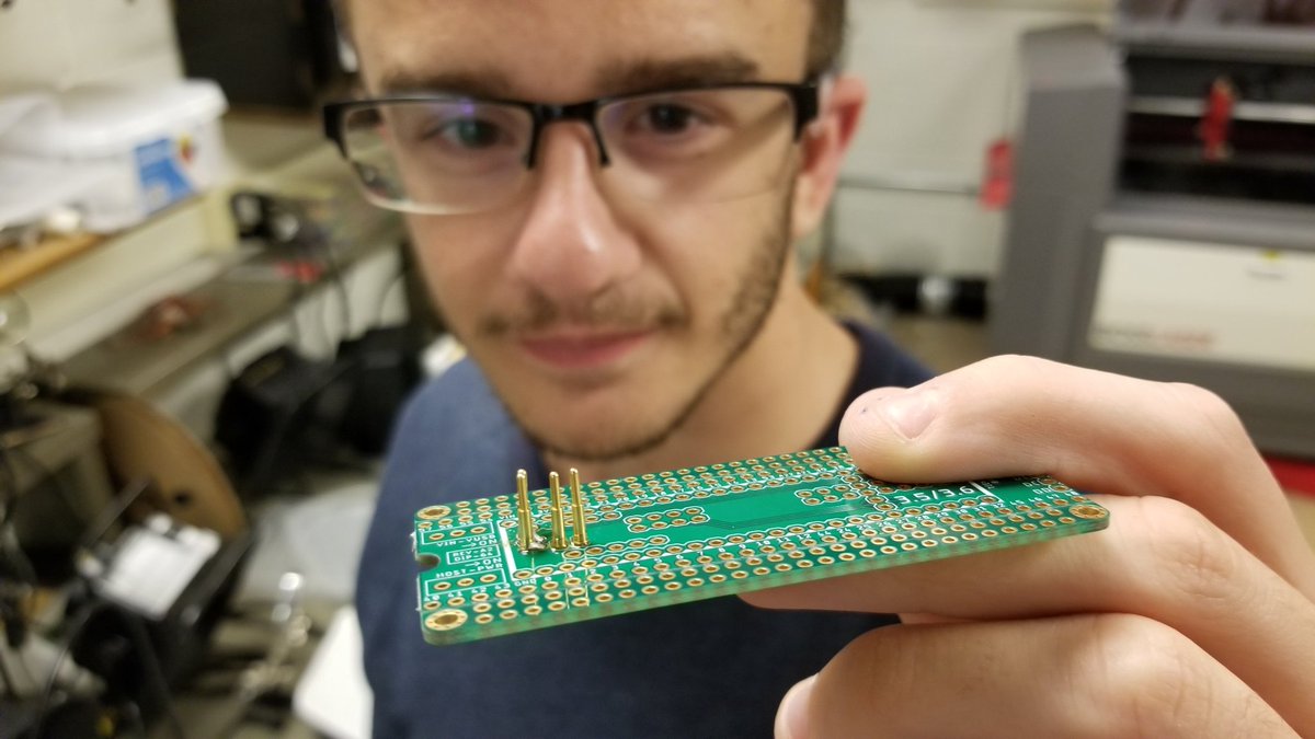 Robin Bouchet ('20) is the first student <a href="/GeorgeSchool/">George School</a> to experiment with pogo pins! Here, he's soldering them onto a Teensy 3.5 socket kit for his RGB LED light cube for his independent project. (He loves pushing the envelope!) His cube will make 1.061BILLION color combinations.