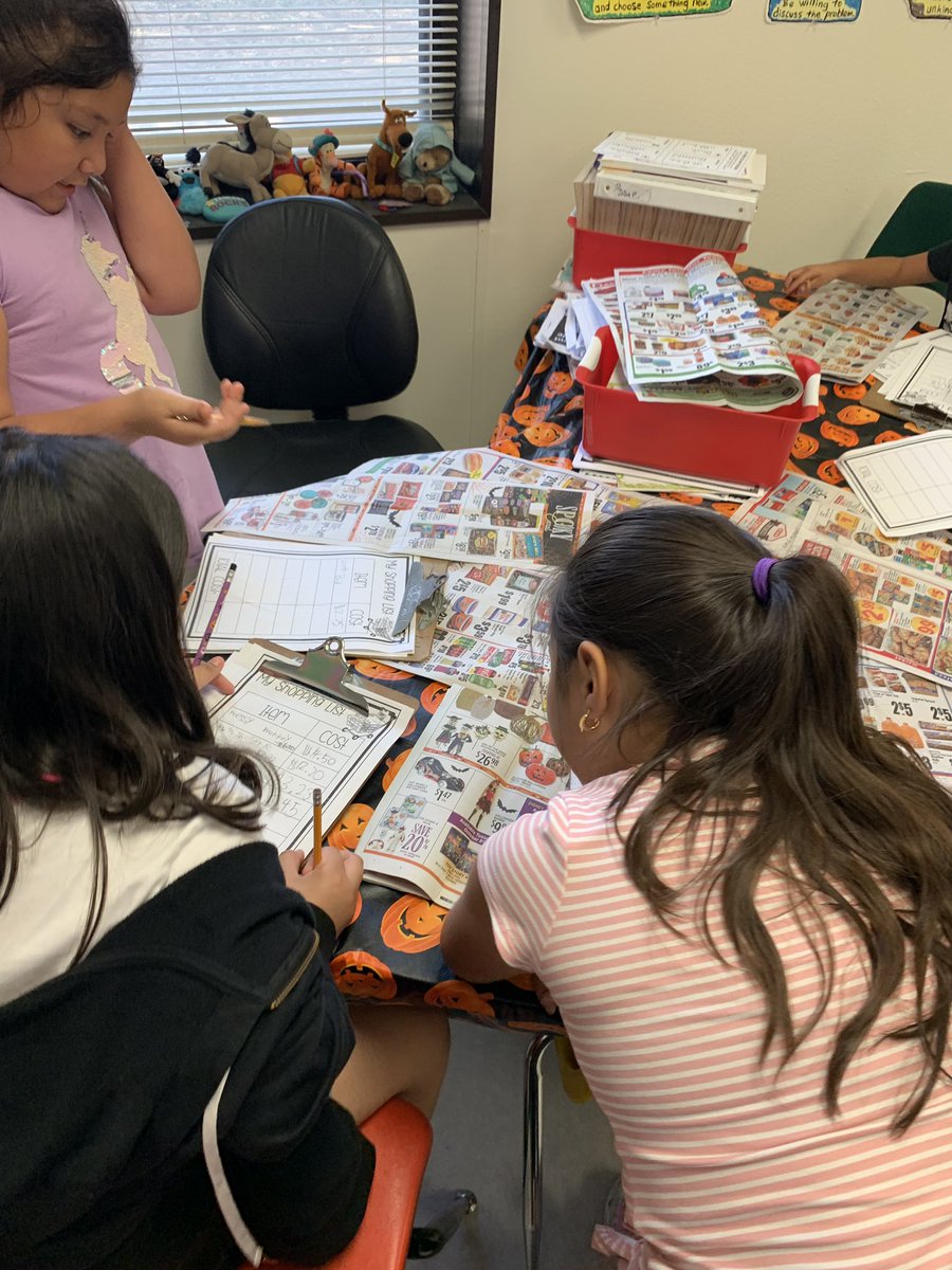 Kids in Ms. Lawhorn’s class are learning how to add and subtract money.  Today they got to create their own “shopping” list... students had great conversations justifying what items they bought with their “$20.00” #realworld