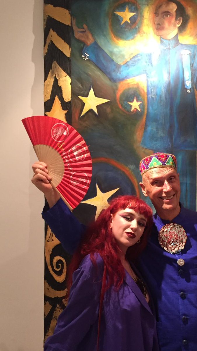 f4cade_'s tweet photo. “I spent my last evening being 18 at Andrew Logan and Jennifer Binnie’s private view last night - such a beautiful display of colour - here’s a pic of me and Andrew in matching blue suits ;)”~ Angel @AndrewLoganAMW #gallery286 #artisticadventure #art #sculpture #artist https://t.co/IPXaWWUsWz