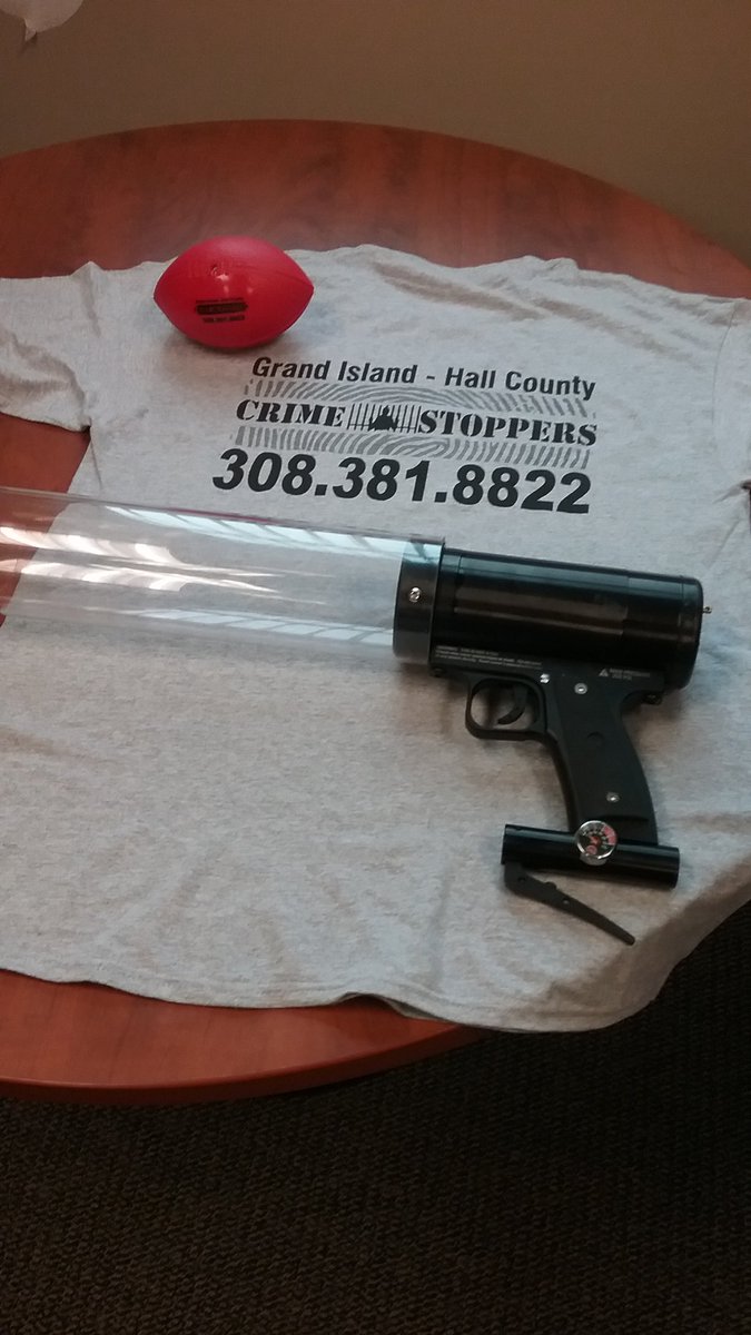 grand_crime's tweet photo. If you want one of these, we have a new t-shirt cannon. Thanks to a generous donor! Come see us at Wood River, GISH, or Doniphan football games Friday night. #catchthetshirt #GIPD #HCSO https://t.co/Nsy15kDLCH
