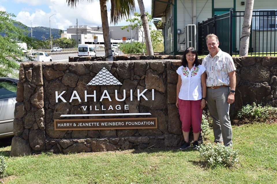 RepEdCase's tweet photo. With Connie Mitchell of @IHSHawaii, donating a surplus Mac computer to Kahauiki Village near the airport; model solution to homelessness with some 60 formerly homeless families now working and sheltered https://t.co/c9mEDLCed2