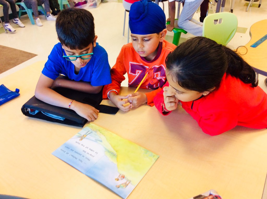 MmeHoorpah's tweet photo. Grade 4 students intently reading their book and figuring out how to put together their first French skit of the year #presentationorale #enfrançais #frimm #frenchimmersion #fsl @RidgewoodROARZ @Daddison7 https://t.co/Y6LKPvfUBc