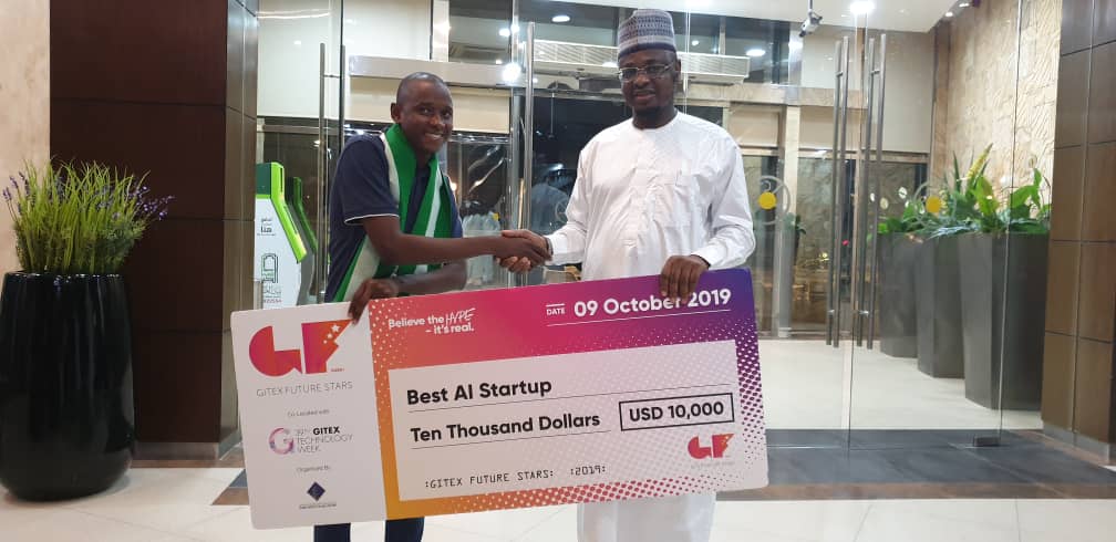 FMCIDENigeria's tweet photo. The Honourable Minister of Communications 🇳🇬, @DrIsaPantami with Mr Abdulkarim Bashir, the young Nigerian who won the Startup Innovation Competition, defeating 750 contestants from 73 Countries during #GITEX2019 Super Nova Challenge held in Dubai, UAE.

#GITEXFutureStars https://t.co/ikSN63aQ7K