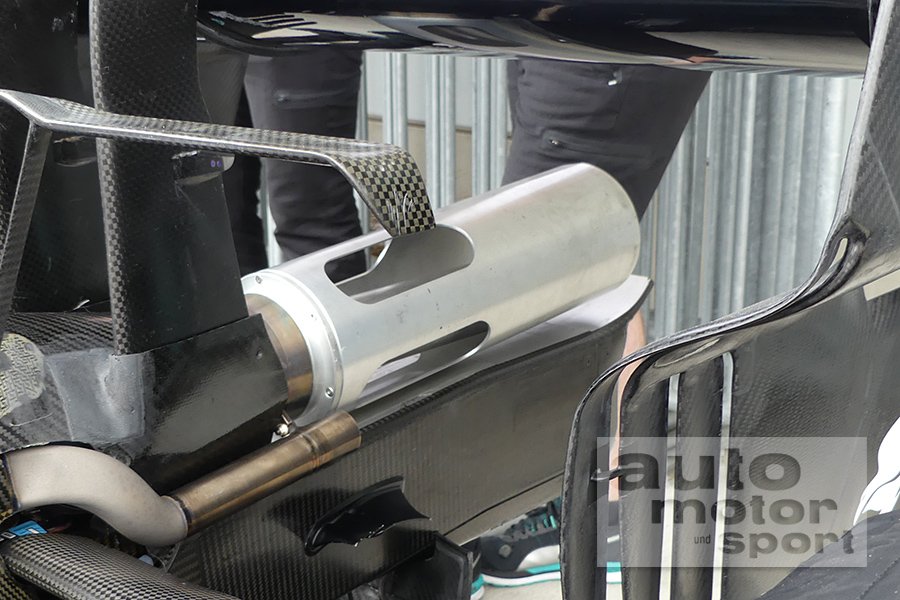 tgruener's tweet photo. Mercedes just arrived with a ridiculous exhaust cover to scrutineering. No idea what's that about?!

#F1 #AMuS #JapaneseGP https://t.co/dQxYJ6DiHv