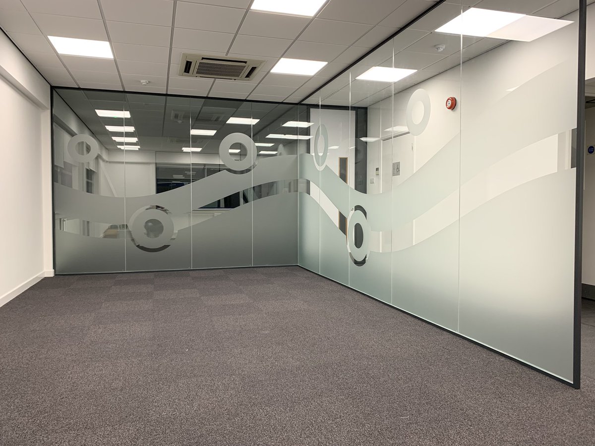 Mrs Howe’s funky new wall frosting covers the glass walls in the breakout area of the new offices - waiting for the furniture.