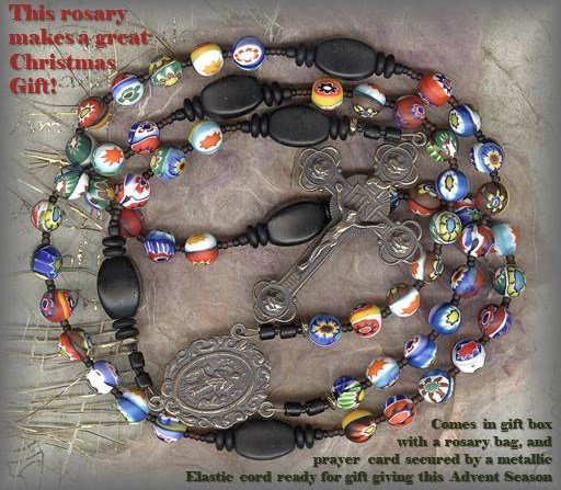 RosaryWorkshop's tweet photo. Christmas shop now for loved ones! "RMK.21340" #Mary, #UndoerofKnots. #MILLEFIORE BEADS-Made in #Venice on the island of #Murano. PATER BEADS:Vintage matte black beads from #Gablonz (1930’s.).CENTER:Mary, Undoer of Knots. To buy click here: https://t.co/hT8OaEuHCp https://t.co/iWv8iLgr3P