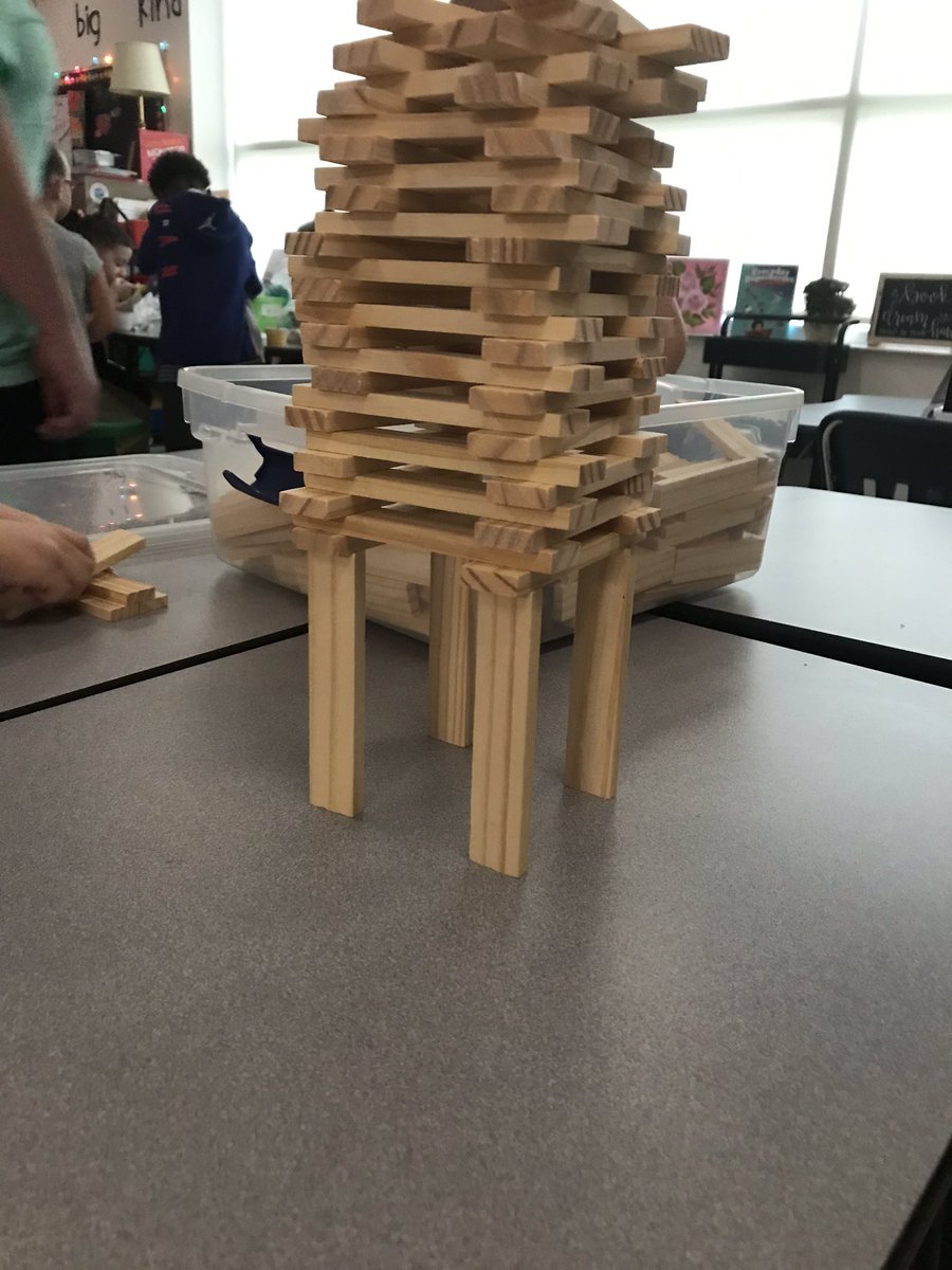 Khigh711's tweet photo. How cool!! This @KEVAplanks tower is being held up by only 4 vertical planks!  Love what they come up with each morning!  Their creativity always amazes me!  #ycsdstem #engageycsd @LBDonatelli @kecagle @ycsdstem https://t.co/KGwIRpYUGB