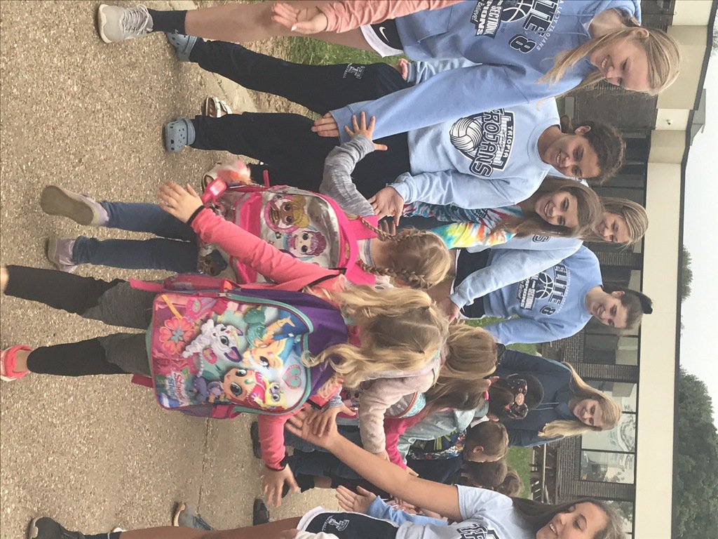 TriopiaCUSD27's tweet photo. Shout out to the volleyball team for greeting the students this morning!  They take on Greenfield tonight at Triopia - hope to see you there!  #triopia https://t.co/fHgxkqkryv