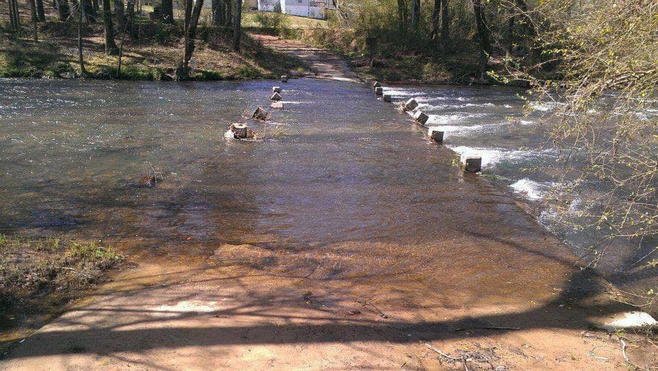 boyfromdixie's tweet image. This is the under water bridge where i live you pull your car out in the middle and wash it, until another car comes and starts blowing its horn at you to get out of the road.   lol