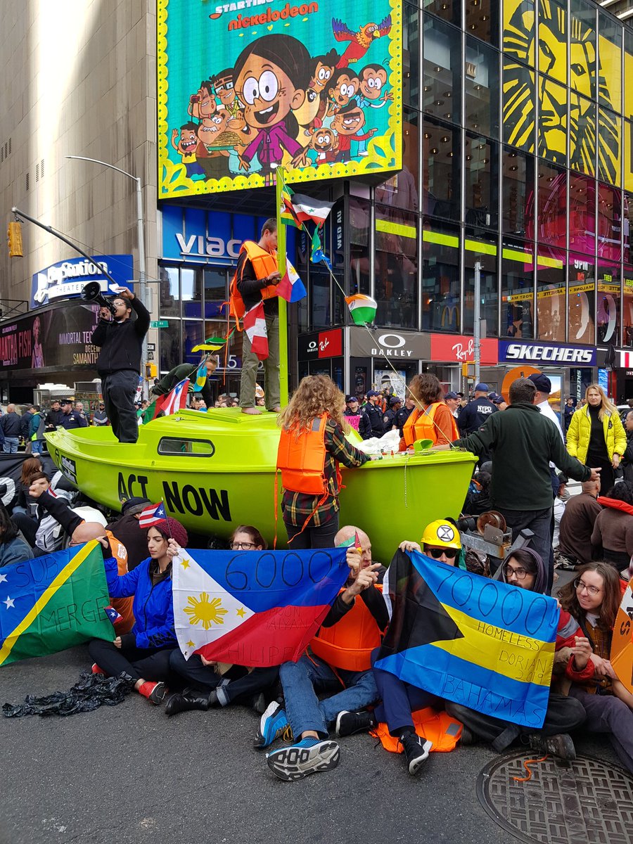 Times Sq blocked for hours by #XRNYC #ExtinctionRebellion <a href="/XR_NYC/">Extinction Rebellion NYC 🌎</a>. so powerful to see #Nonviolence #civildiscobedience #ClimateAction working out big time!
