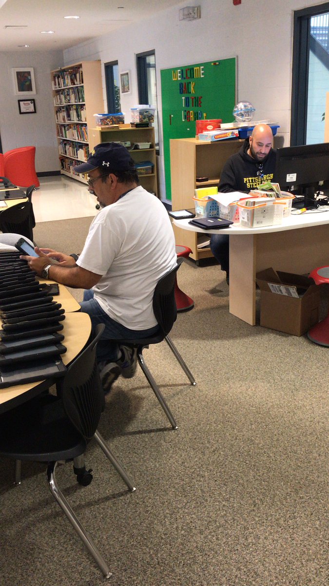 SWickett22's tweet photo. LTSS staff hard at work helping us get ready for Brightspace @RedWillowPS #peel21st https://t.co/jL8q9ooACA