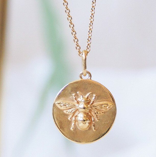 Gold coin goodness⁠ .⁠ .⁠ .⁠ .⁠ .⁠ #beecoin #coinnecklace #bumblebeenecklace #goldnecklace #inspirebynature #delicatejewellery ift.tt/2q2oTBX