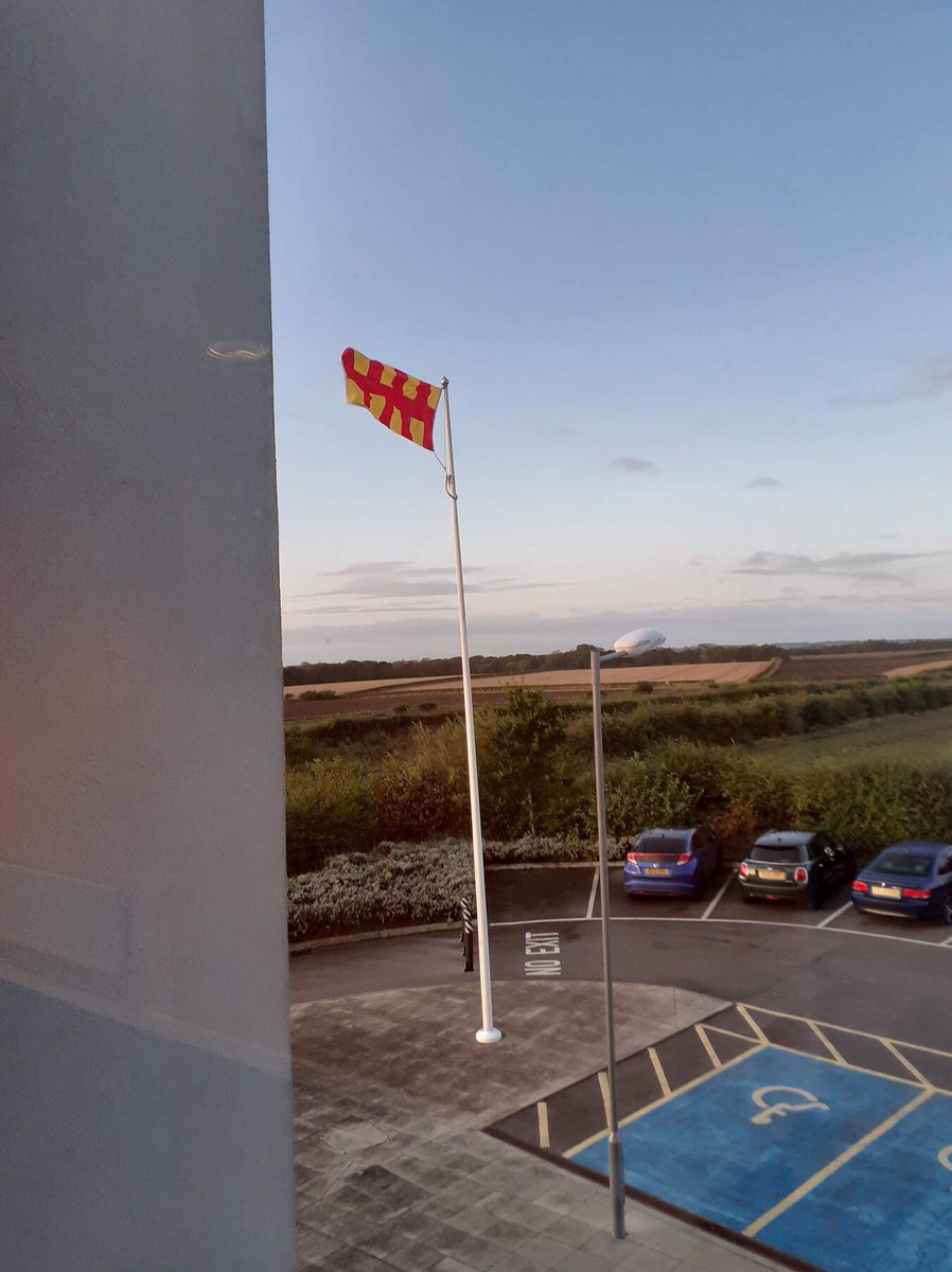 NLandFRS_PO's tweet photo. Delighted to see a brand new @N_landCouncil county flag flying from @NlandFRS #PegswoodCFS😊It’s design is based on a gold and purple flag used at the tomb of St Oswald of Northumbria in 641 😲#LittleBitOfHistory #FabFlag #TheRedAndGold #ProudNorthumbrian https://t.co/Mh3UAHYjI0