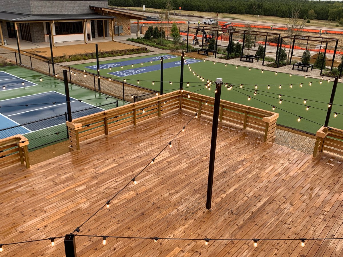 CoCreateNetwork's tweet photo. Daytime, but dark enough the lights are on, so here's a sneak preview: Imagine you get work done in your private office, walk outside for a break on the deck, a quick game of shuffleboard or even a beer at Standard Service. All possible with an office at CoCreate. https://t.co/TgQvGUc2jG