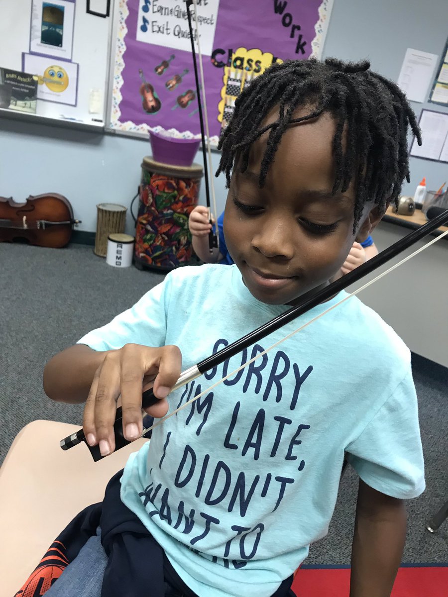 PowellOrchestra's tweet photo. We are working hard and having fun in Strings! Check out first grade mastering their bow holds! @PowellesPLAY https://t.co/A6o9WR2AI9