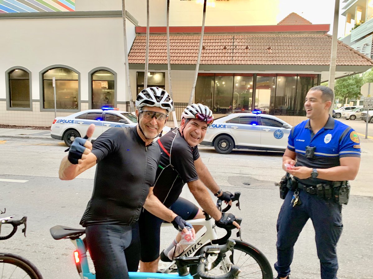 CmdrEllington's tweet photo. @MiamiPD Brickell Team educating pedestrians and bicyclists about the importance of using crosswalks and designated bike lanes #WalkWise https://t.co/XwREJMlge3