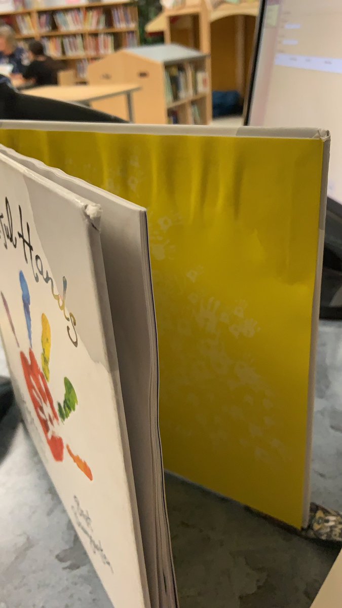 Reminder not to have water bottles in with library books