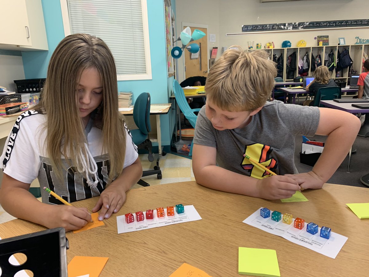 GwenPolitis's tweet photo. Students explored place (where a number is located) and value (what a number is worth) today. Partners worked together to identify place and value in 6-digit numbers. #RRESOnward #TeachCabCo #MovingMountains #collaborate https://t.co/x3rlxGgT9y