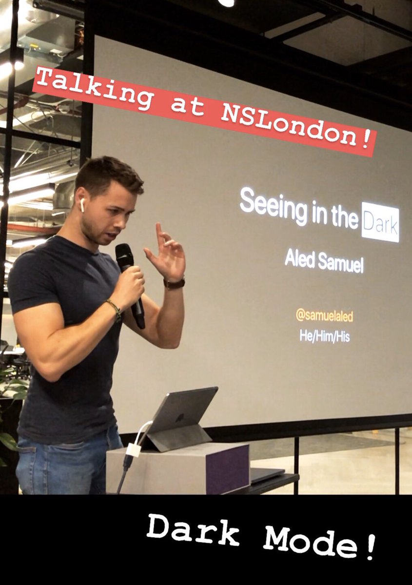 Photo of me mid speech on my lightning talk on dark mode in iOS 13.