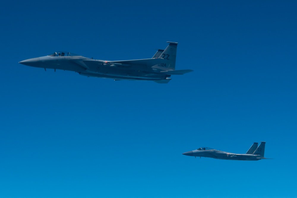 USPACOM's tweet photo. .@Air_Fifth Pilots with the #909th Air Refueling Squadron conduct fueling exercises with #44th Fighter Squadron thousands of feet above the ground, flying at #230mph. @KadenaAirBase #KC135 #F15C #AirPower #Partnerships #FreeandOpenIndoPacific https://t.co/fQrrSl5niw