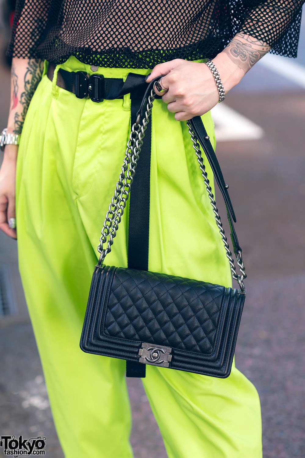 Tokyo Fashion on X: Tatsuya wearing a neon street style in Harajuku. His  look features an H&M mesh top (showing off his tattoos), vintage pants, a  quilted Chanel bag, LV accessories, and