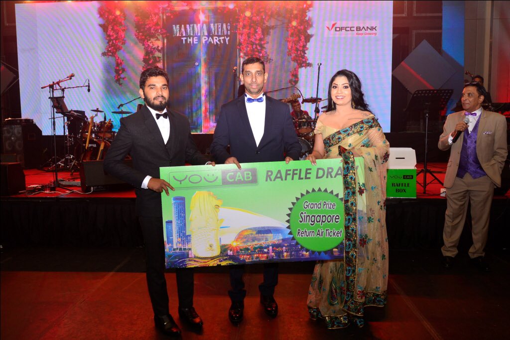 YouCabLK's tweet photo. YouCab: Official Transport Partner for the DFCC Staff Dance 2019 • We also conducted a Raffle Draw at the Dance with a Grand Prize of a Return Air Ticket to Singapore • Pictured (left to right) is the Lucky Winner of the Grand Prize Mr. Thineshkan with DFCC and YC officials https://t.co/lDihWyrrgs