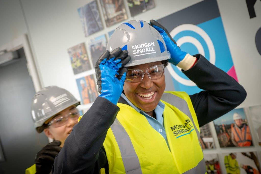 morgansindallc's tweet photo. On #DayoftheGirl, we are proud to celebrate the message that construction is for everyone. Women are underrepresented in our industry, and we’re working with the next generation to ensure it becomes more diverse. #MorganSindallConstruction https://t.co/1WpcHTps2W