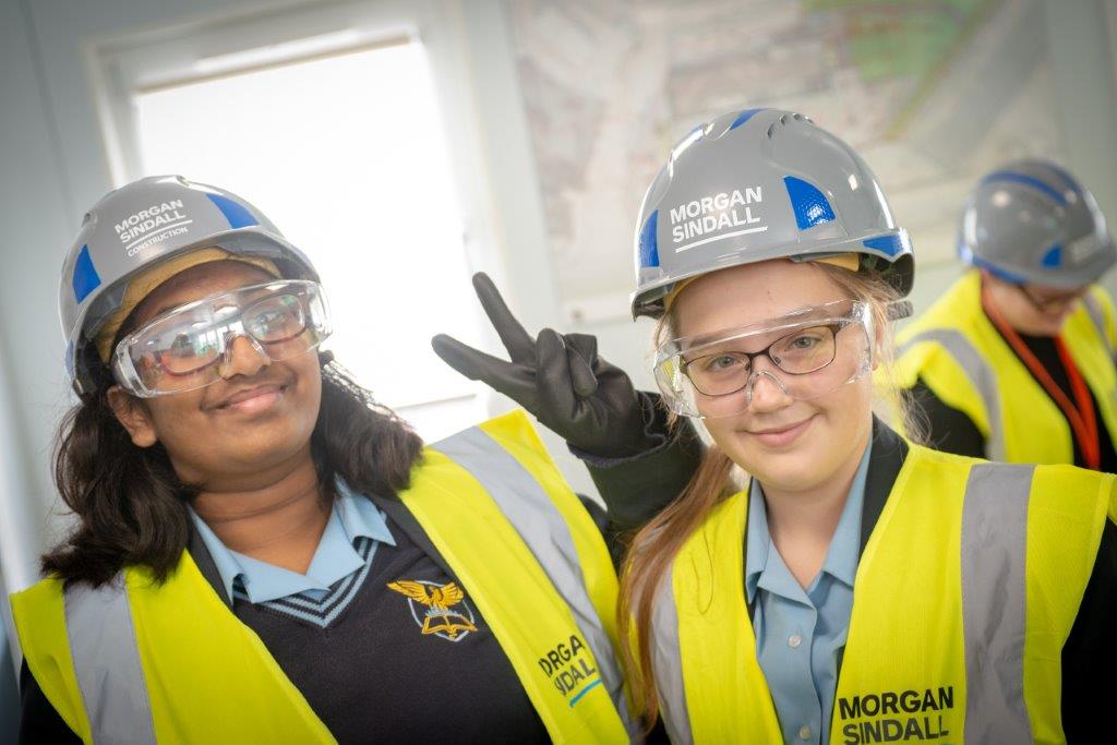 morgansindallc's tweet photo. On #DayoftheGirl, we are proud to celebrate the message that construction is for everyone. Women are underrepresented in our industry, and we’re working with the next generation to ensure it becomes more diverse. #MorganSindallConstruction https://t.co/1WpcHTps2W