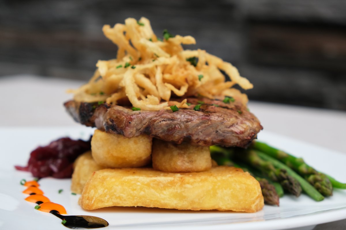 Treat yourself this weekend with our 40 day 10 oz dry aged rib eye steak locally sourced from Sherlocks Butchers. Served with home-made thick-cut chips and crispy fried onions and asparagus. A must for any steak-lover!