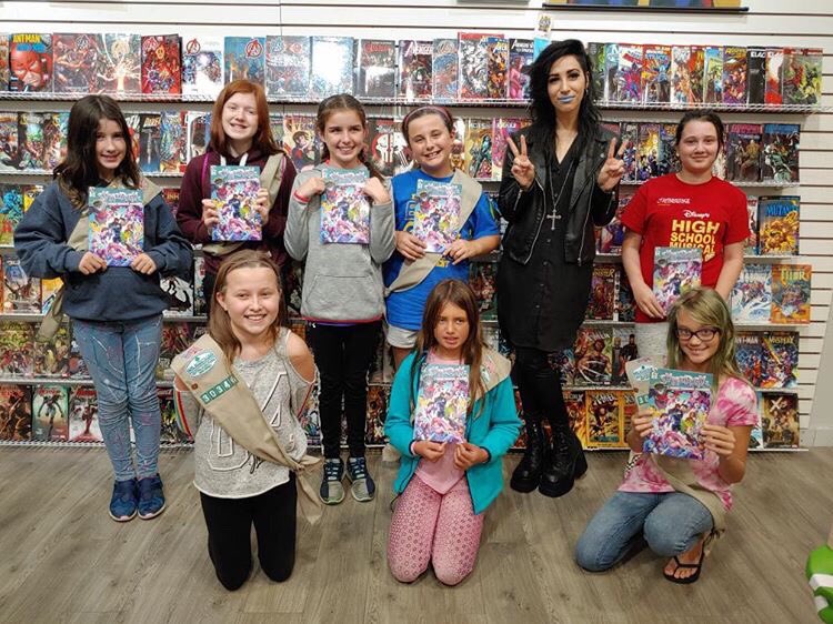 ElainaUnger's tweet photo. I was invited to hang out with the Girl Scouts the other night and we talked about comics for their Comic Book Badge! Thank you @IDWPublishing for the books! The kids were so stoked! @megan_mb @IDW_David_M https://t.co/0QGz05frdG