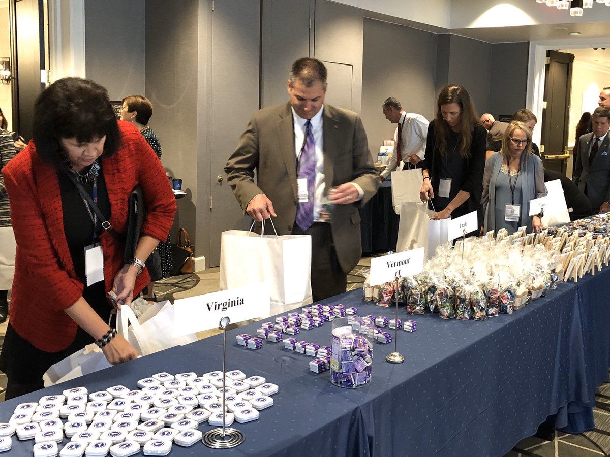 NAESP's tweet photo. A tradition each year at the #naespNDP celebration is when honorees share mementos from their home states. Lots of fun trinkets—and tasty treats! Thanks for sharing your state pride! https://t.co/lhcPz7mSgI