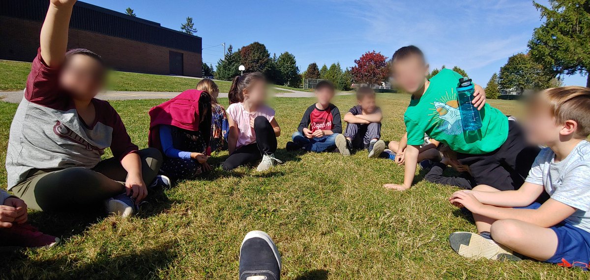 MissJaskula's tweet photo. We start every drama class with a "campfire"...this is our circle of trust. Drama can be a very vulnerable subject, so it essential for us to feel comfortable taking risks. We had our campfire outside on this beautiful Friday! @EnniskillenPS https://t.co/84oxIIOolA