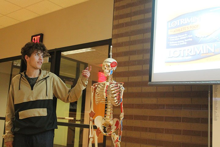 Yadira Rivera, Madison Bounds and Dalton Grassman teach the class. This week in Mr. Leven's anatomy class, students taught about skin diseases.  #weareconnected #echsyearbook #echsacademics