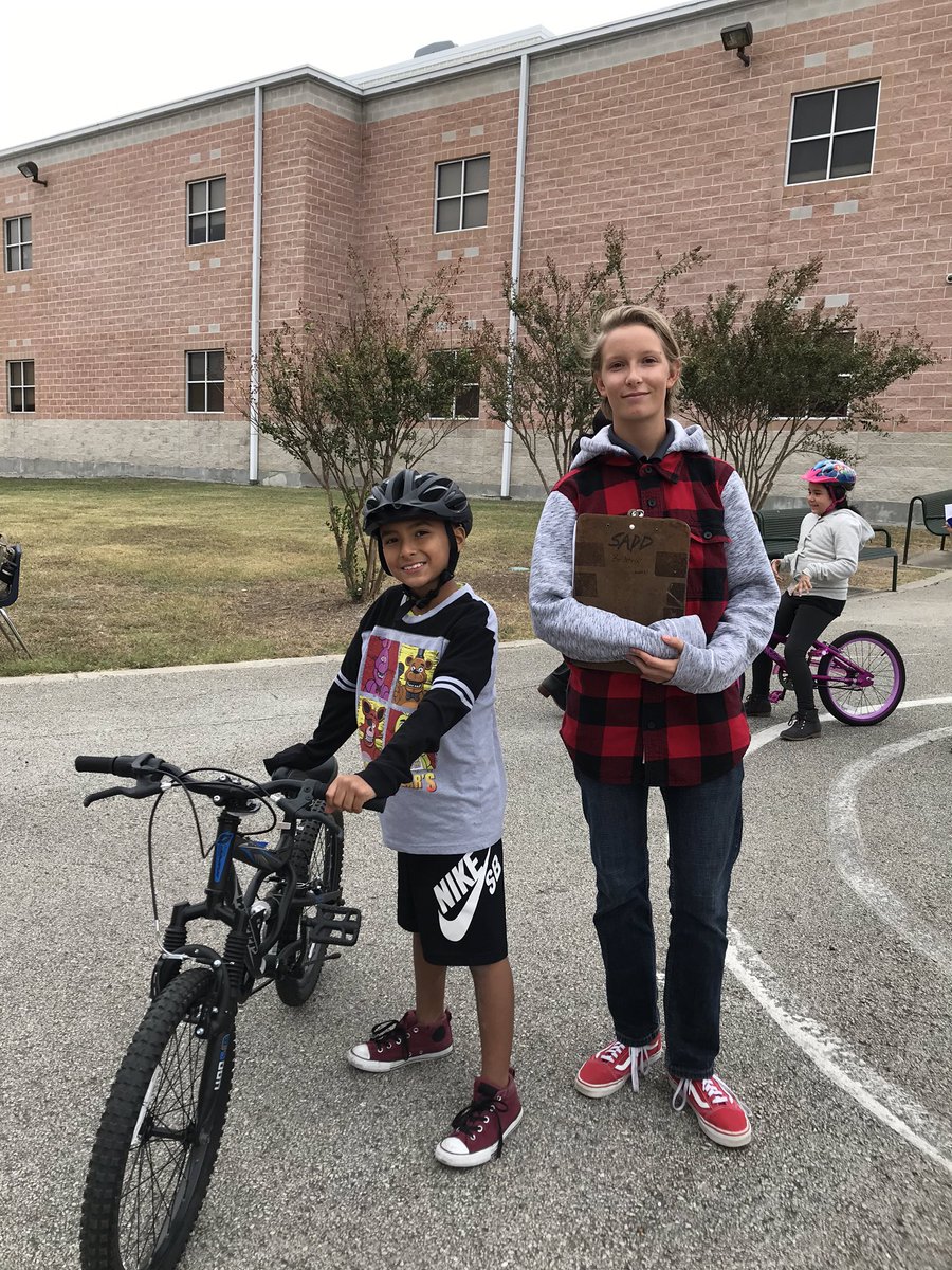 jmarshallrotc's tweet photo. Even in 50° temperature and a light drizzle our cadets helping out this morning @NISDRhodes with their bike rodeo. @NISDMarshall @NISD https://t.co/x6cyPAIAuF