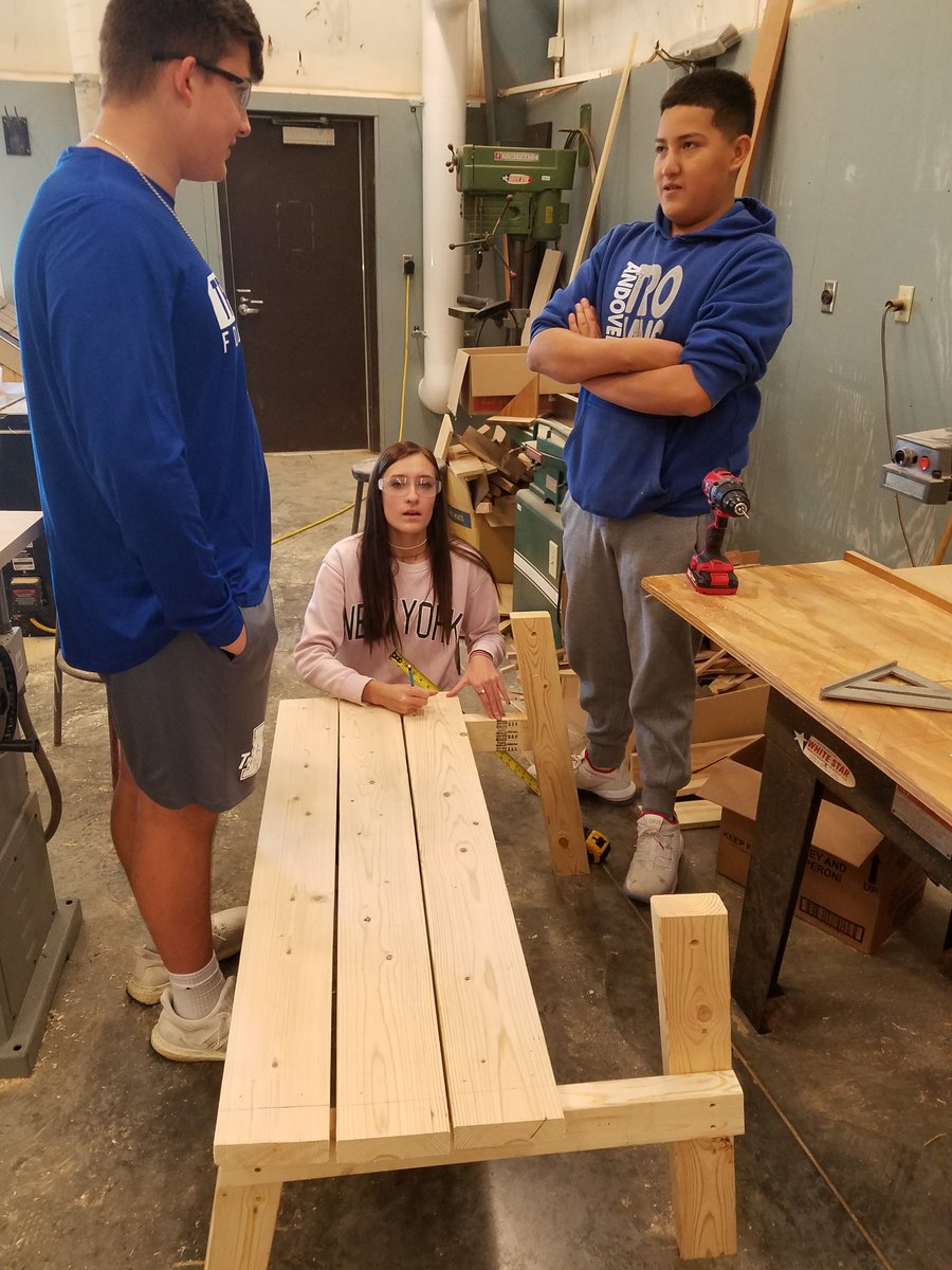 GeometryIn's tweet photo. Bench/Picnic Tables are being painted and assembled in GIC class.  #ahstrojanfam https://t.co/VZnUVSOOYG