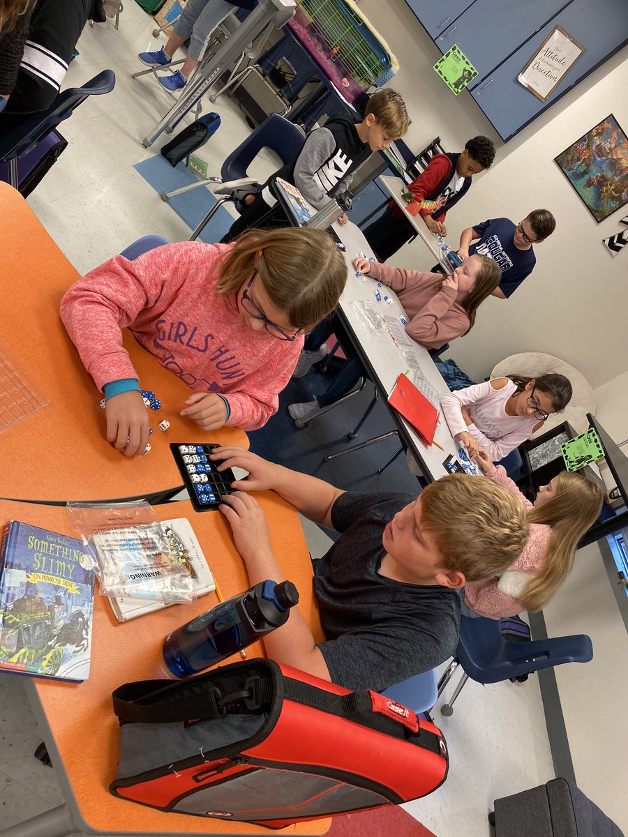 Coal9131's tweet photo. Students learned a new dice game to practice order of operations and then reviewed rounding decimals with an online game called Gimkit. Best thing was a student was able to join his classmates and play from home while out sick!   #alloursallin #ourwhy @jenkscsis @sportsfanCS https://t.co/FEtoqVxLJj