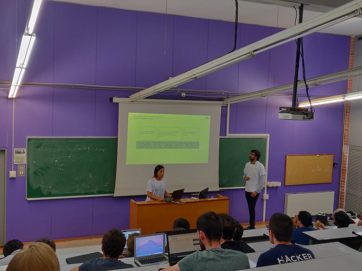 hackupc's tweet photo. Our friends from @everis have a really interesting challenge on data for cities, and in their talk they're explaining a bit more about it ☁️🏙️ https://t.co/5GUJHrK7nq