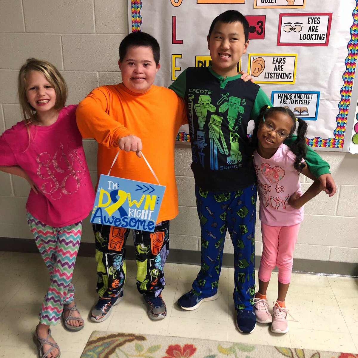 ElainnaAllen's tweet photo. We had a DOWN right awesome day wearing our pajamas to spread Down Syndrome Awareness! 💛💙💛💙 @TweetDCS_LES #LESpats #RelationshipsMatter #TeamDCS https://t.co/64eV0E7bFj